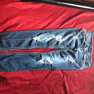 Hydraulic ripped jeans